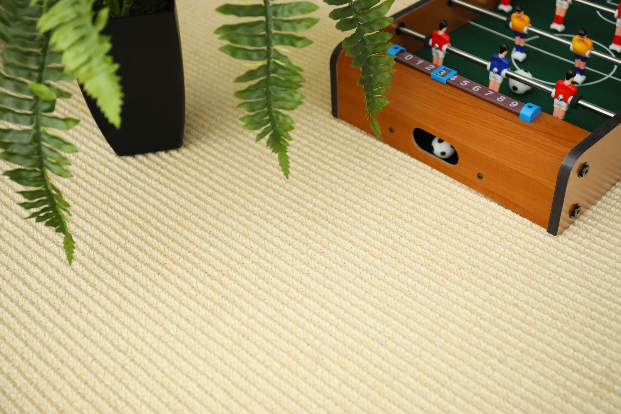 Sisal Loop Pampa avec texture naturelle et boucles épaisses dans un intérieur chaleureux
