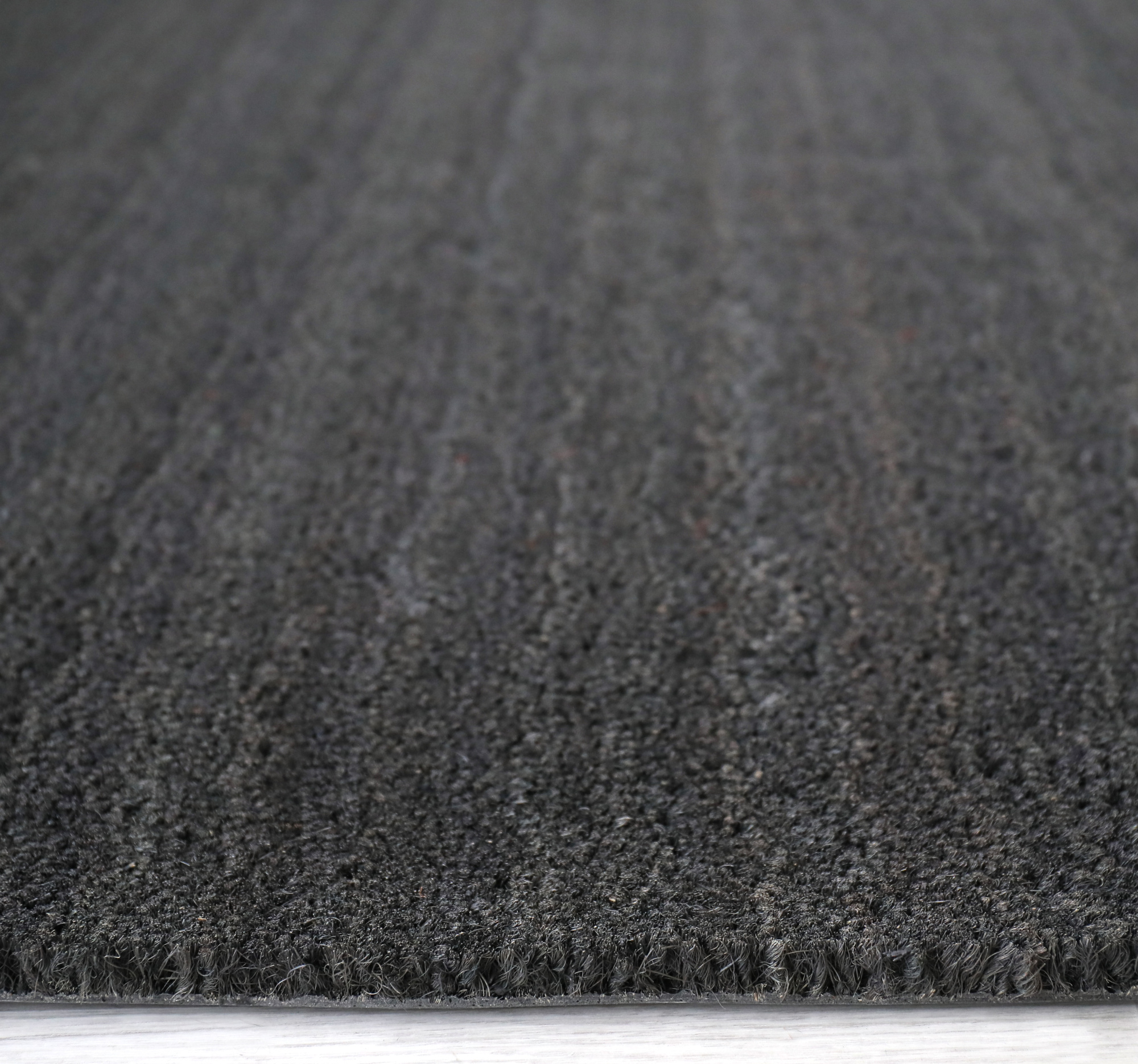 Paillasson coco anthracite 17 mm, détail des fibres naturelles imputrescibles