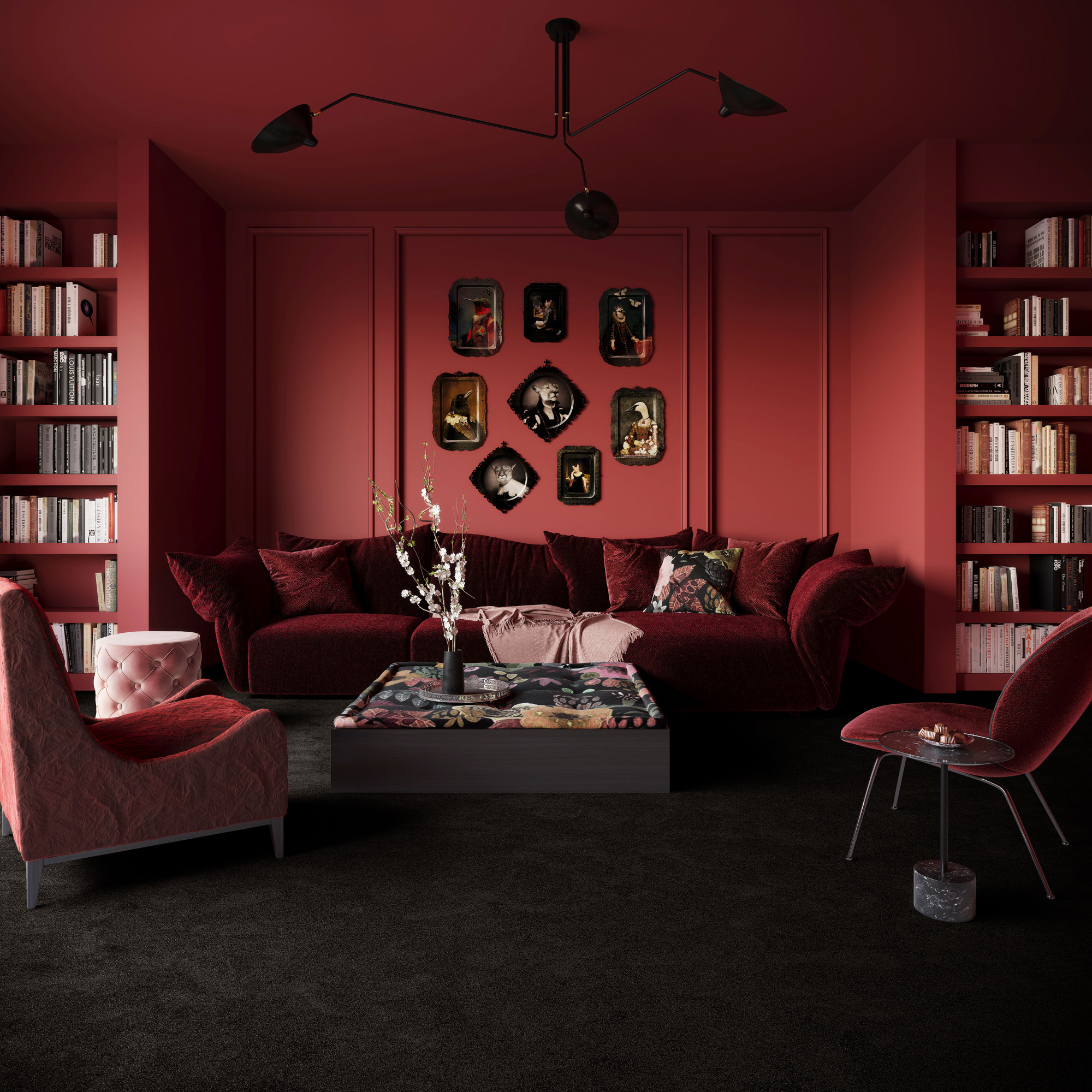 Vue large d’un salon élégant où la moquette Chroma Sense Noir carbone recouvre le sol, entouré de murs rouges