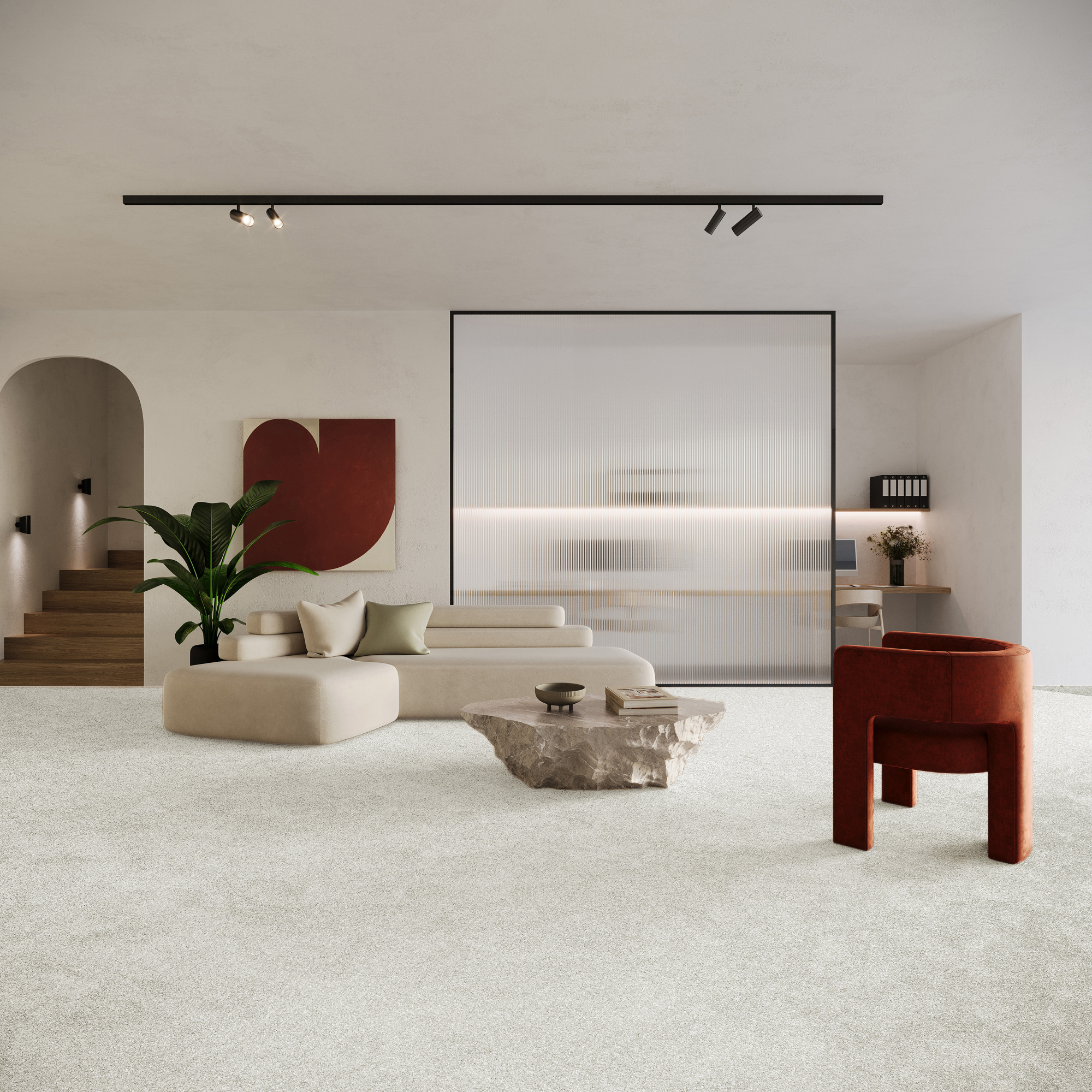 Moquette Infini 11.5 - Gris urbain associée à un mobilier design pour un intérieur moderne et apaisant
