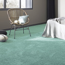 Moquette douce Délicatesse - Vert sauge créant une atmosphère fraîche et relaxante dans un intérieur contemporain
