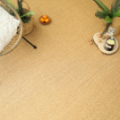 Sol Sisal - Crafted - Malt dans un espace aménagé avec fauteuil tressé et plante verte