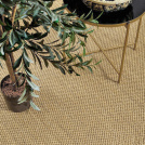 Sol Sisal - Muse - Malt dans un intérieur naturel avec plante verte et table d'appoint en métal