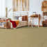 Sol Sisal - Muse - Malt dans une chambre à l'esprit bohème avec mobilier en bois et textiles naturels