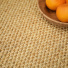 Sol Sisal - Crafted - Malt accompagné d'un plateau d'agrumes posé sur le revêtement