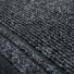 Tapis de passage Antidérapant au mètre - Noir, détail des fines boucles et des deux bandes décoratives en relief