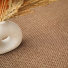 Revêtement de sol Crafted Ambre, texture tissée régulière et nuances ambrées naturelles