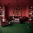Vue d’ensemble d’un salon moderne avec la moquette Chroma Sense vert foncé