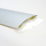 Détail du 301172 Seuil 40 mm adhésif sous gaine Alu incolore avec film de protection adhésif