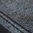 Tapis de passage Antidérapant au mètre - Anthracite, trame chinée et double ligne en relief révélées en détail